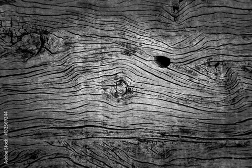 Pattern cracked old wooden background.