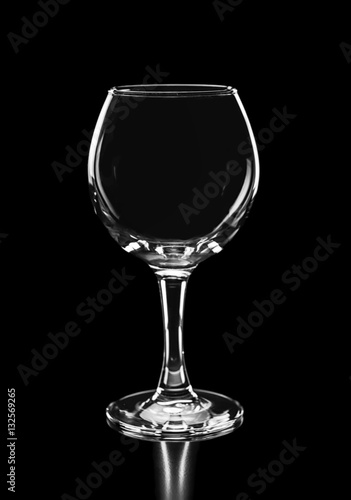 beautiful silhouette of empty wine glass isolated on black backg