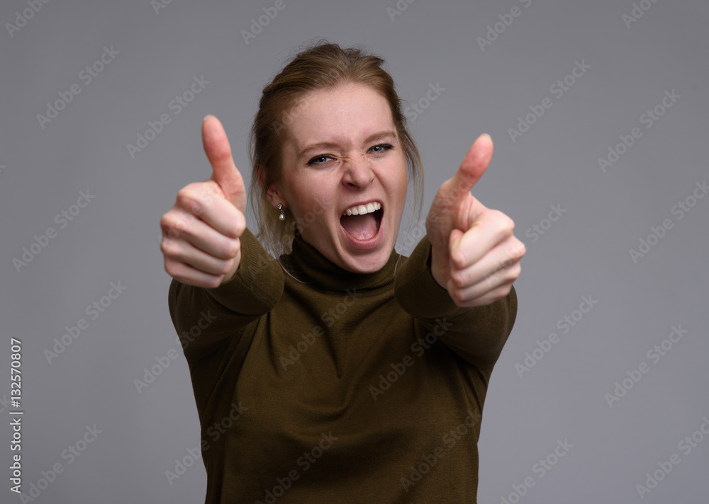 beautiful woman showing his thumbs up beautiful woman showing his thumbs up