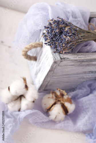 lavender and cotton with violet textile on white wooden table. s