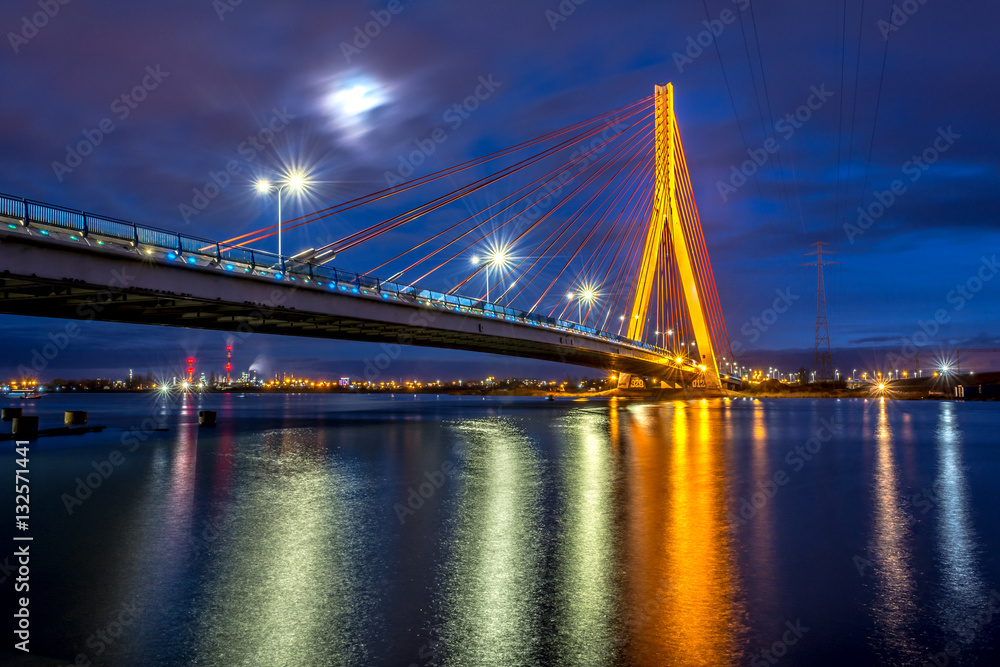 Cable stayed bridge over Martwa Wisla river at night in Gdansk. Poland  Europe.