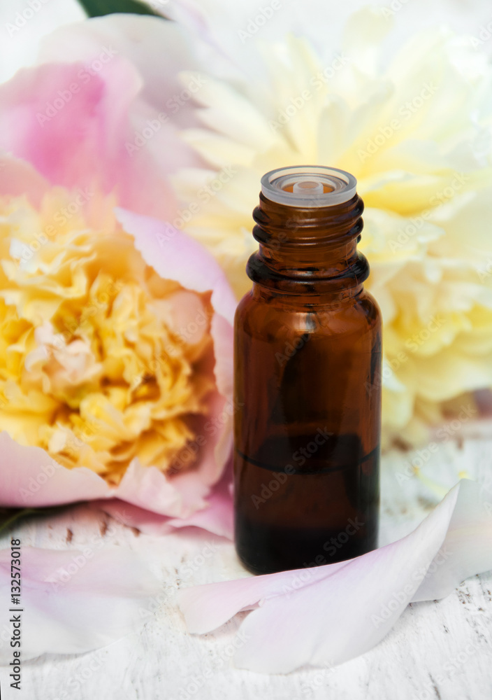 Peony flowers and massage oils