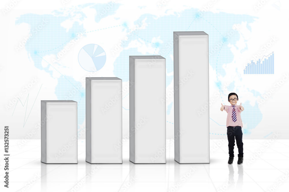 Business child next to a graph Business child next to a graph