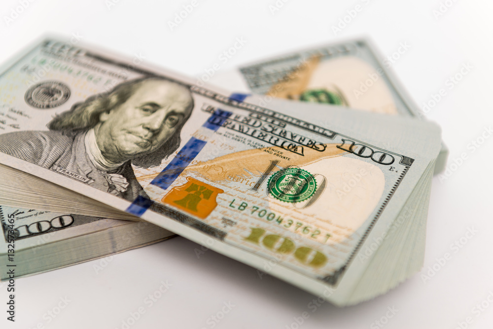 Stack of money in hundred dollar banknotes Stack of money in hundred dollar banknotes