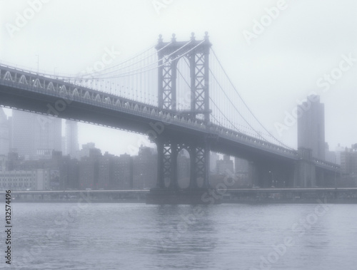 Manhattan Bridge at fog.