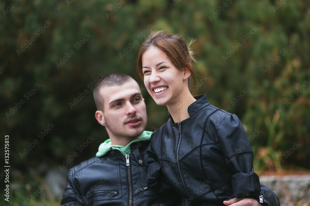 Fototapeta premium Romantic relationship between invalid young woman born without arms and her boyfriend. 