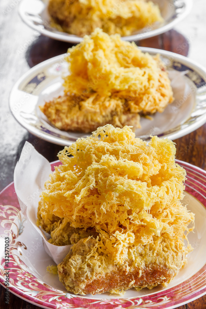 Fried shredded rice grain with banana.Thai dessert Fried shredded rice grain with banana.Thai dessert
