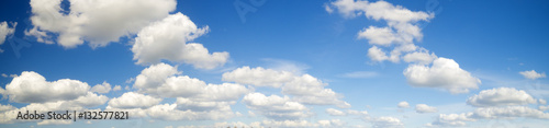 puffy white clouds in the blue sky,panorama photo