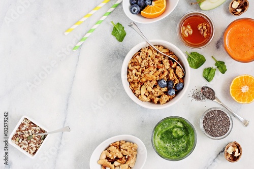 Breakfast set with granola, fresh Juice and various of topping. Healthy eating and super foods concept. 