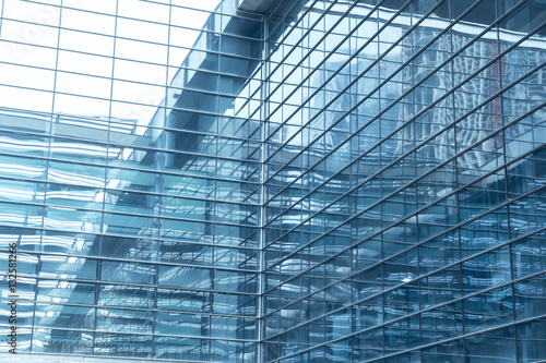 Contemporary office building blue glass wall detail