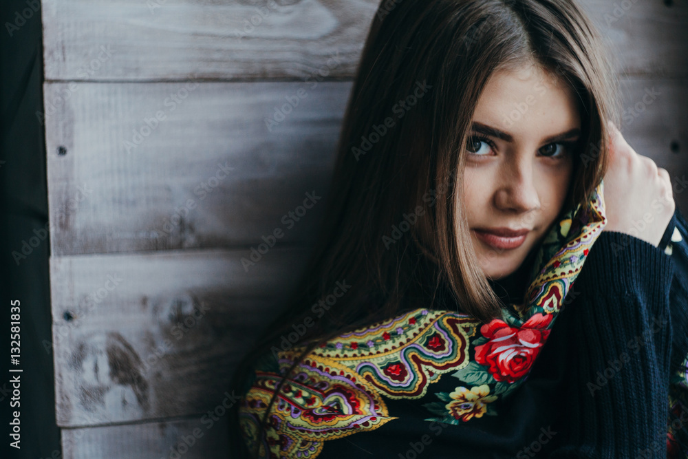 Fototapeta premium Beautiful young woman wearing scarf