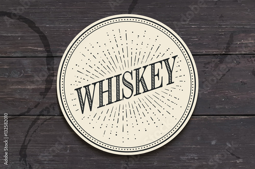 Beverage coaster for glass with inscription Whiskey, light rays and sunburst. Vintage drawing for bar, pub, whiskey themes. Vector Illustration