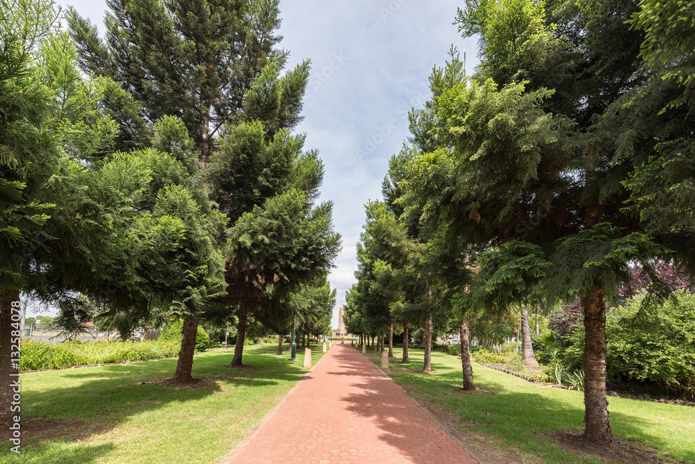 Beautiful Victoria Park with leading trees and memorial statue. Beautiful Victoria Park with leading trees and memorial statue.