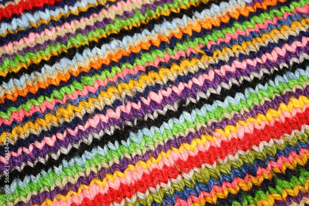 striped diferent colour wool lines Knitting with v stitch on a Peruvian jumper 