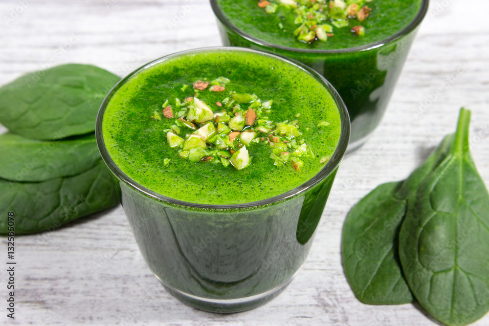 Slimming cocktail with spinach. Glasses of spinach juice. Slimming cocktail with spinach. Glasses of spinach juice.