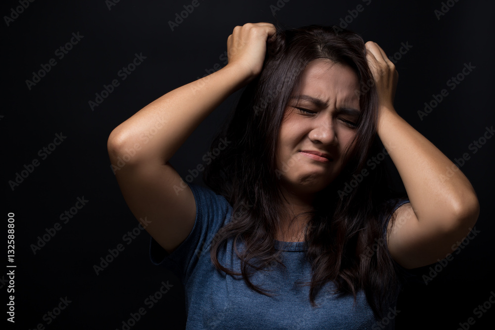 Angry woman on isolated black background Angry woman on isolated black background