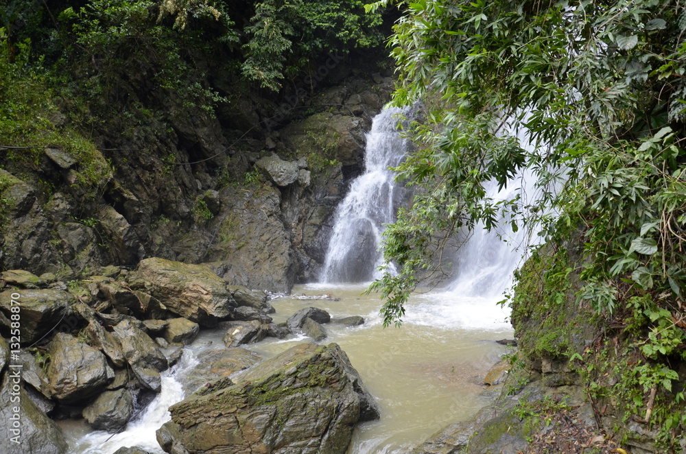 Fototapeta premium Waterfall in deep forest on the mountain.