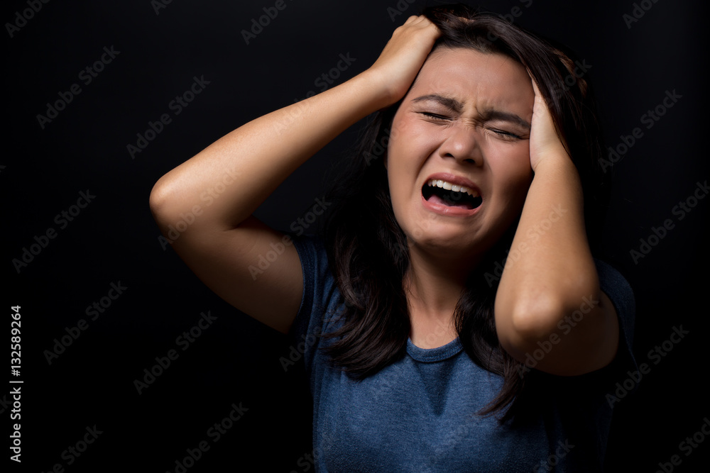 Screaming woman on black background Screaming woman on black background