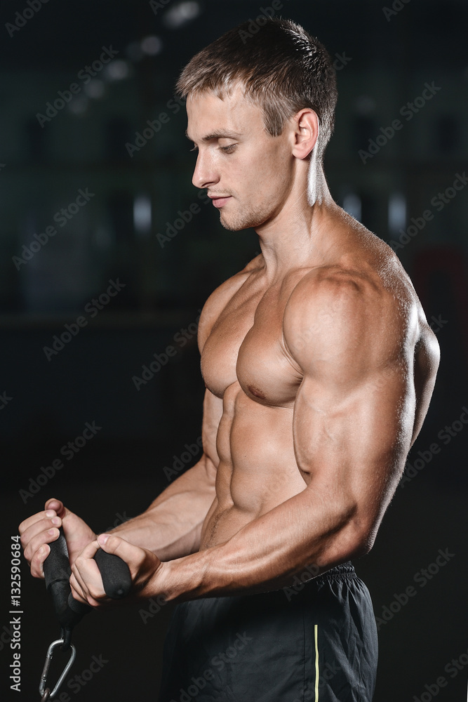 Obraz premium young man train in gym healthcare lifestyle sexy caucasian man.