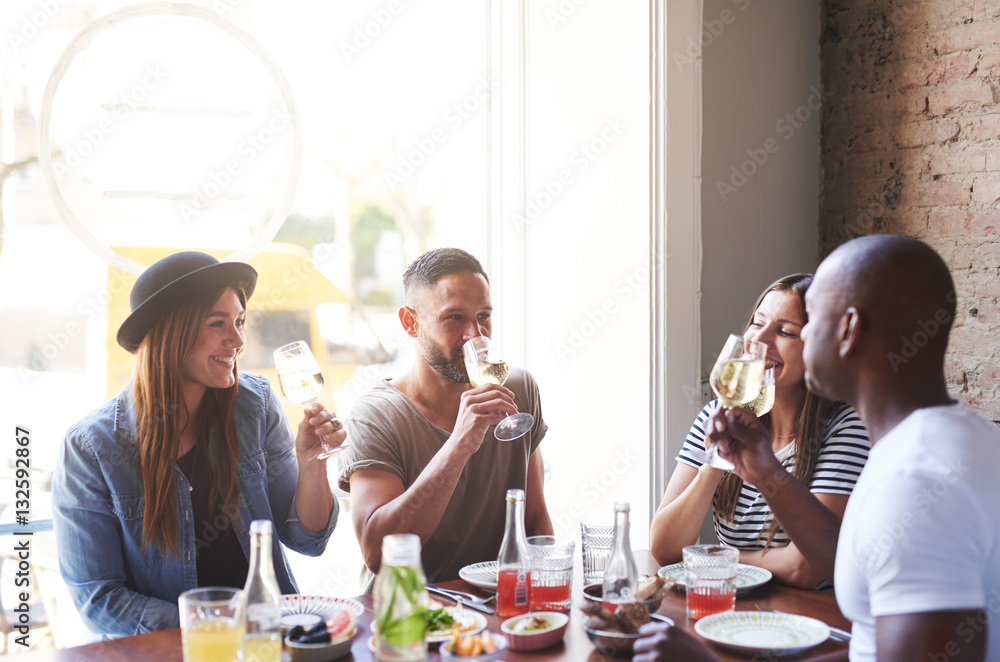 People having fun while dining and drinking