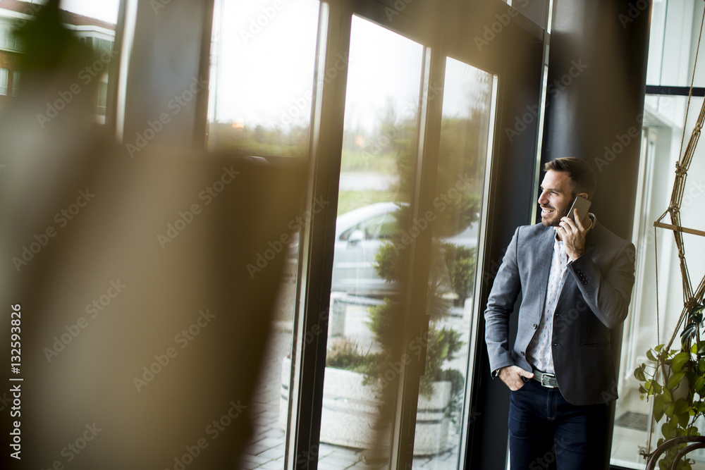 Young man with mobile phone Young man with mobile phone