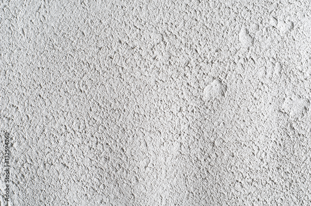 Grey concrete wall or floor. Cement background with visible texture. Natural bubble pattern backdrop. Closeup macro photograph. Top view Grey concrete wall or floor. Cement background with visible texture. Natural bubble pattern backdrop. Closeup macro photograph. Top view