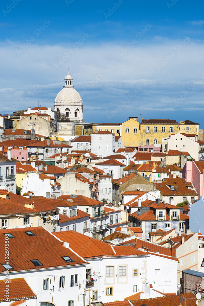 View of the Alfama Neighbourhood in Lisbon, Portugal, with colorful buildings and the National Pantheon