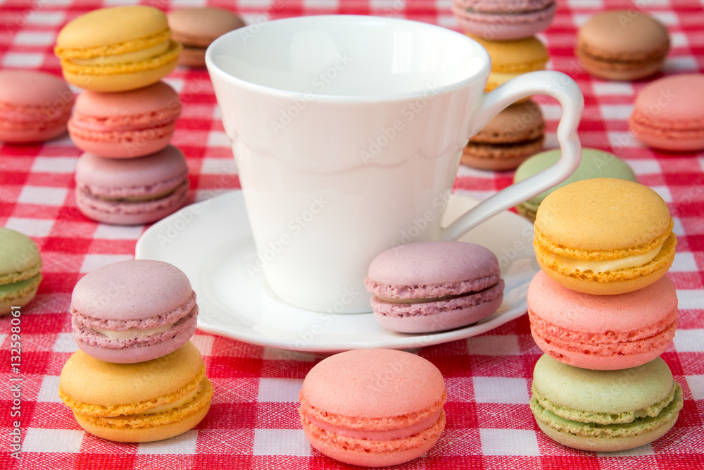 Fototapeta premium Macaroons and white cup