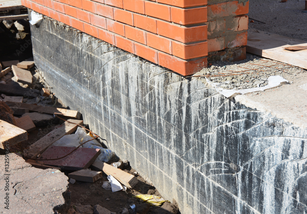 Waterproofing foundation house wall. Foundation Waterproofing and Damp
