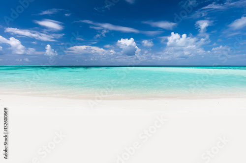 Fototapeta Naklejka Na Ścianę i Meble -  Tropical beach with white sand and clear turquoise ocean. Maldiv