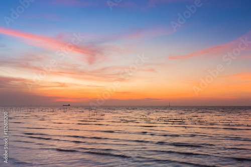 Beauty of sunset over seacoast skyline, natural landscape background