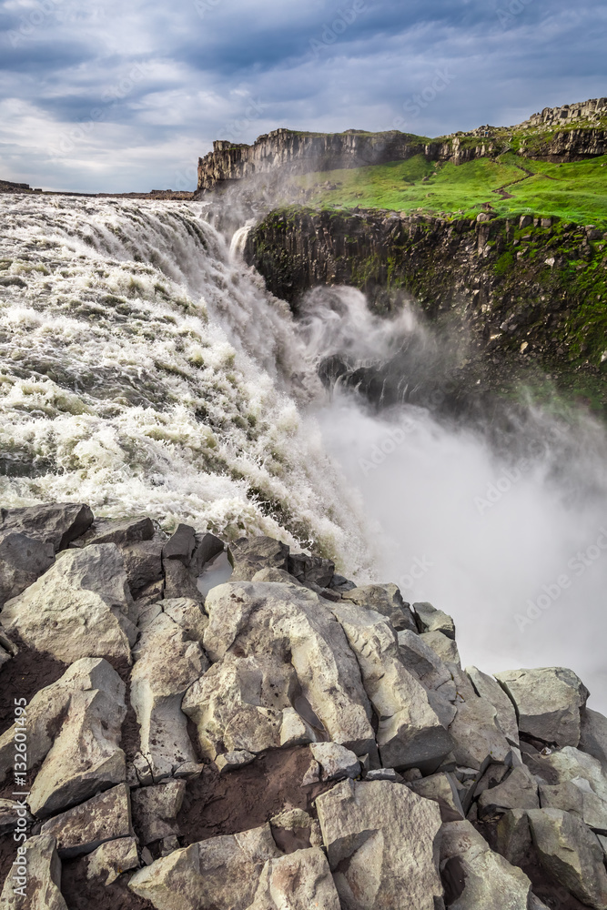Huge waterfall Dettifoss in Iceland in summer Huge waterfall Dettifoss in Iceland in summer