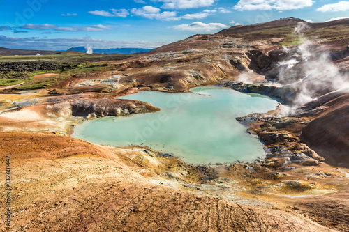 Blue pond on volcano area i...