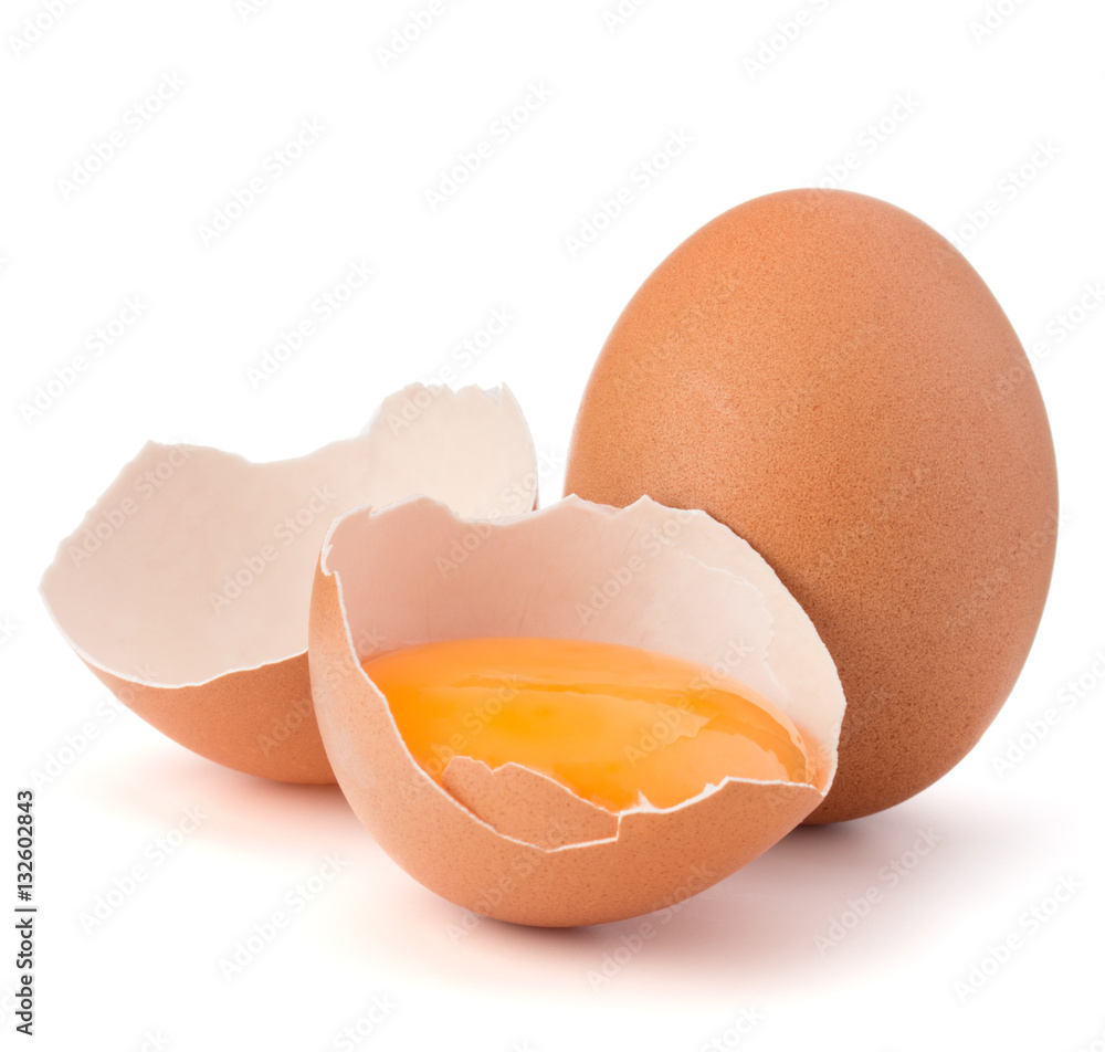 Broken egg in eggshell half and raw egg isolated on white backgr