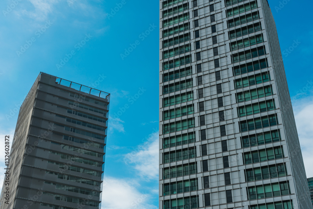 some modern skyscrapers with copy space in the middle