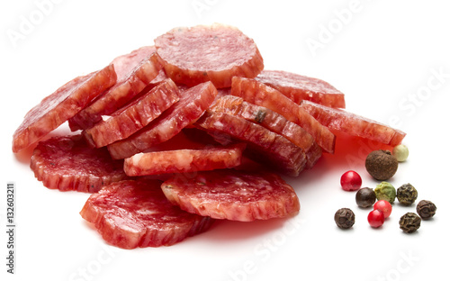 Salami smoked sausage slices and peppercorns isolated on white b
