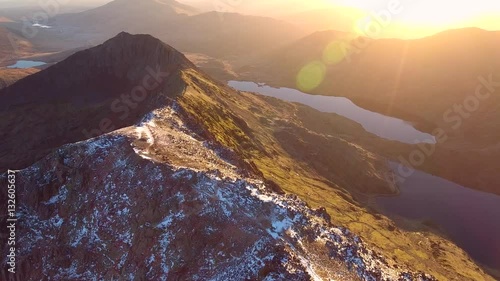 Sunrise in Snowdonia. Aerial view high over Crib Goch in Wales.
