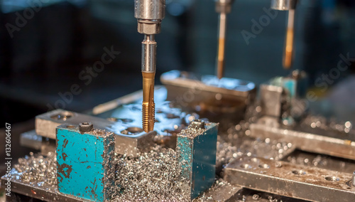 Photography metal drilling and tapping