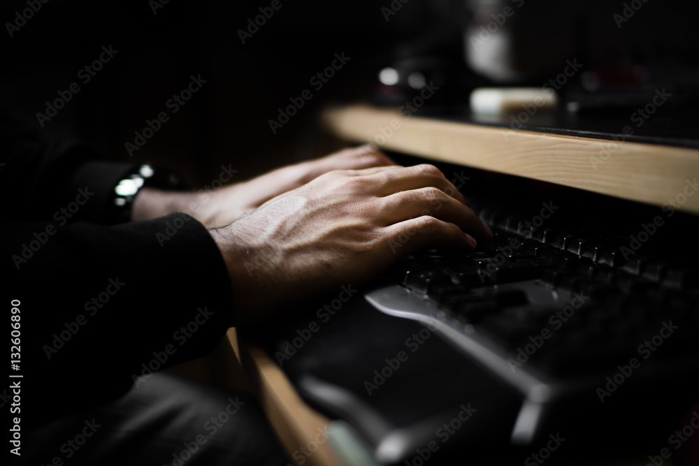 Typing on a Keyboard at the Computer with Backlight Typing on a Keyboard at the Computer with Backlight