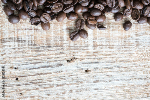 coffee beans on wooden table background