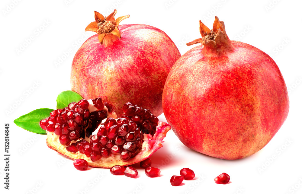 Ripe pomegranates fruit isolated on white background. Grains of pomegranate.