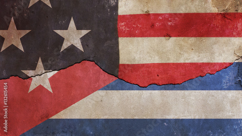 Usa Flag and Cuba Flag on Cracked Concrete Wall