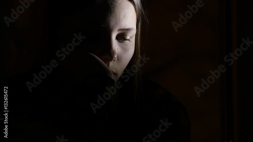 3Scared by something teen girl in the dark. 4K UHD.