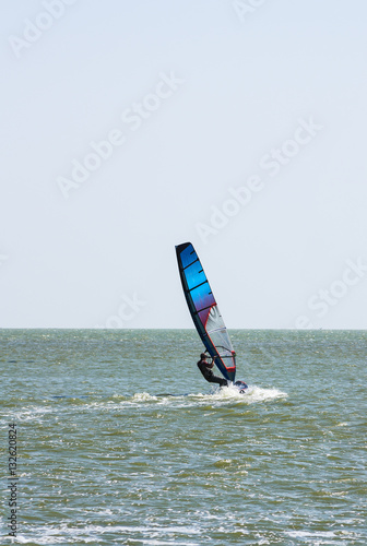 Windsurfing in the sea with a moderate wind