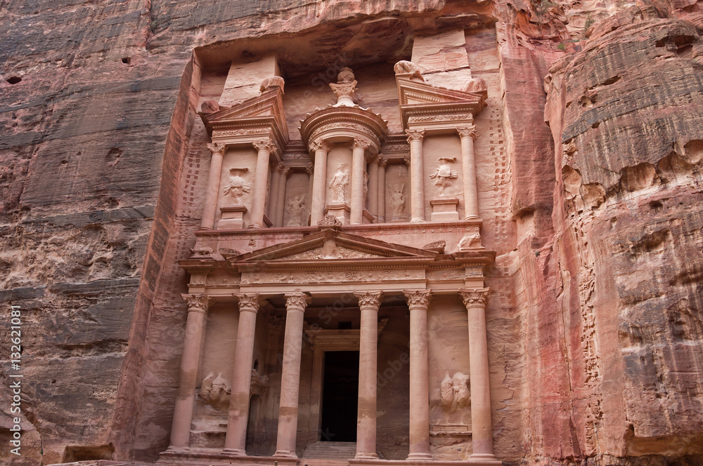 Ancient nabataean temple Al Khazneh (Treasury) located at Rose city - Petra, Jordan. View from Siq canyon.