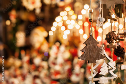christmas decoration tree in the shop, winter street market in Europe photo
