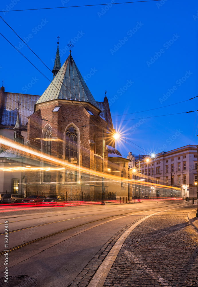 Krakow, Poland, st Francis church and tram light trails