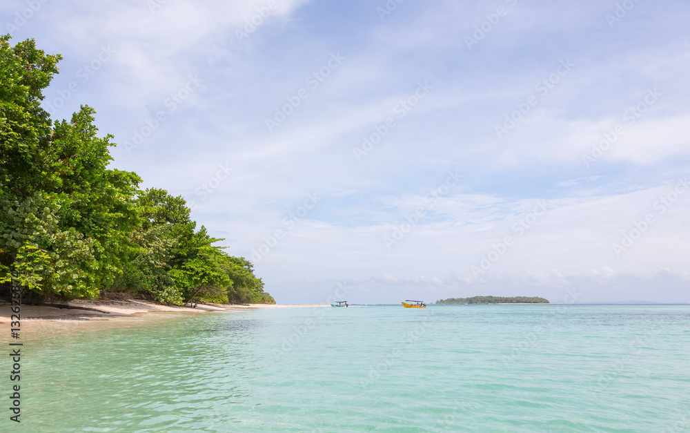 Desert Zapatilla islands and boats on the archipelago Bocas del Toro, Panama