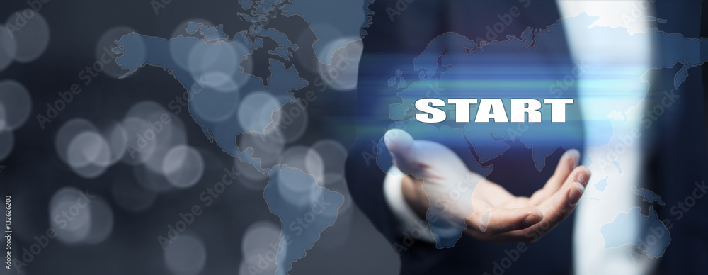 Businessman hand touching START on virtual screen Businessman hand touching START on virtual screen