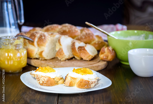 Challah bread on wooden table